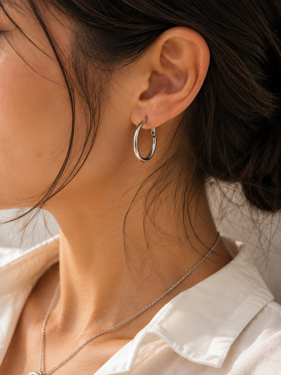 Boucles d’oreilles créoles argentées en acier inoxydable